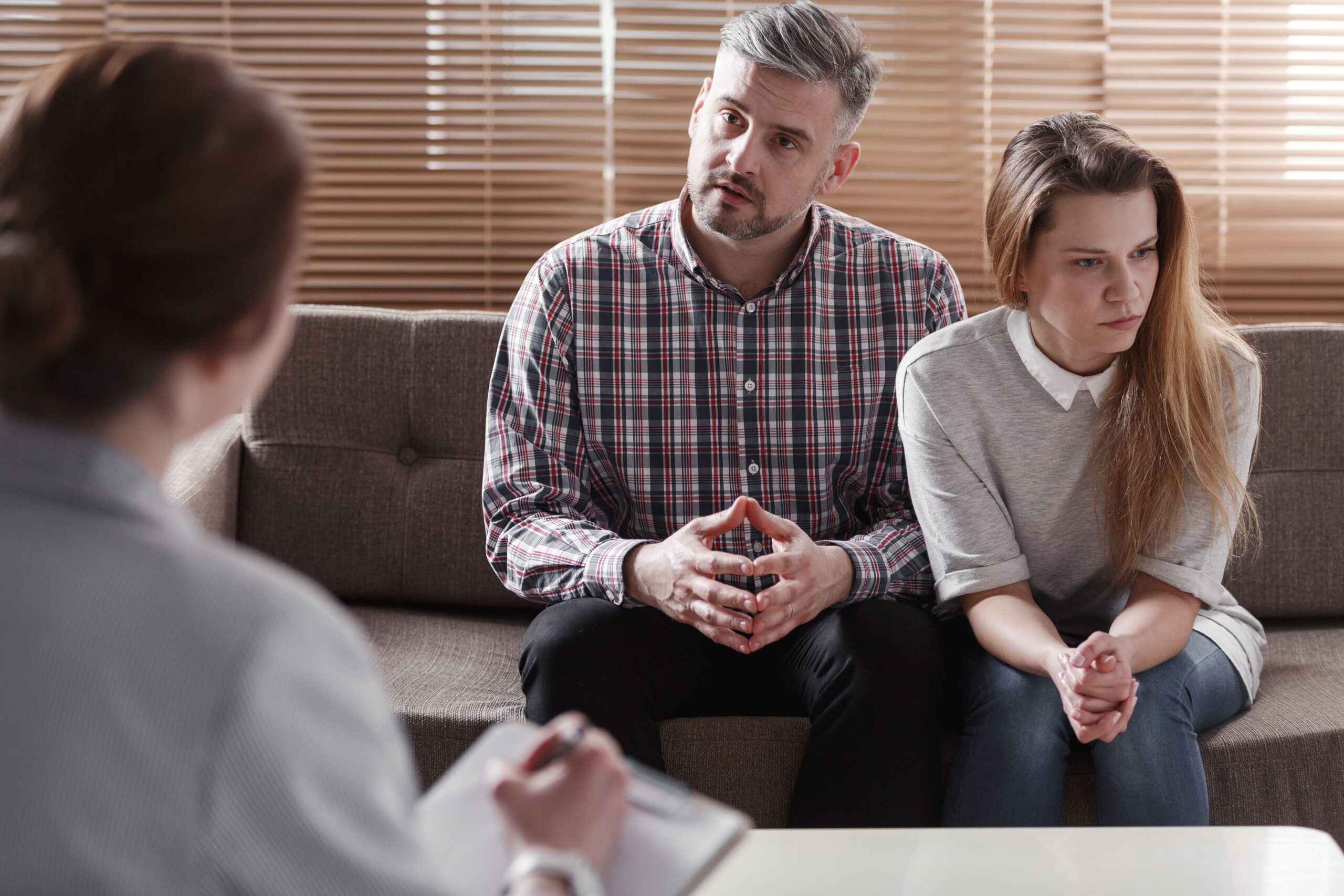 couple attending a mediator for divorce mediation services
