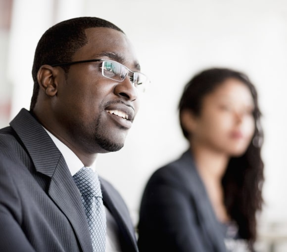 two employees partaking in professional mediation for conflict resolution and Contract dispute resolution services